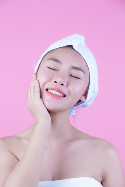 Young woman asia with clean fresh skin touch own face, Expressive facial expressions, Cosmetology and Spa.