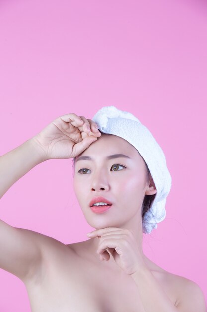 Young woman asia with clean fresh skin touch own face, Expressive facial expressions, Cosmetology and Spa.