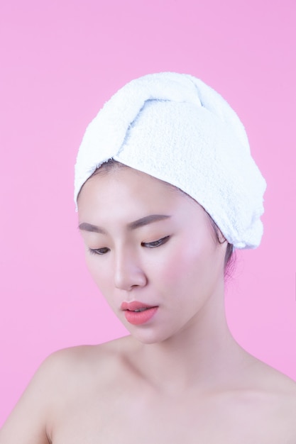 Young woman asia with clean fresh skin touch own face, Expressive facial expressions, Cosmetology and Spa.