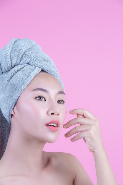 Young woman asia with clean fresh skin touch own face, Expressive facial expressions, Cosmetology and Spa.