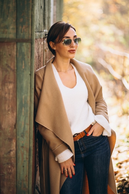 Young woman in autumn park