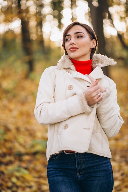 Young woman in an autumn park