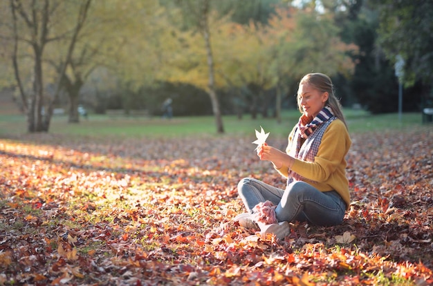 young woman in a autumnal park