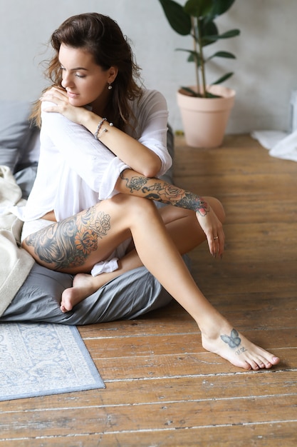 Young woman in bed at morning