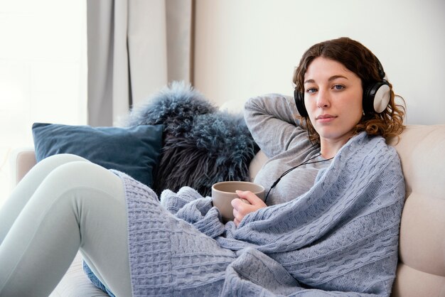 Young woman being quarantined at home