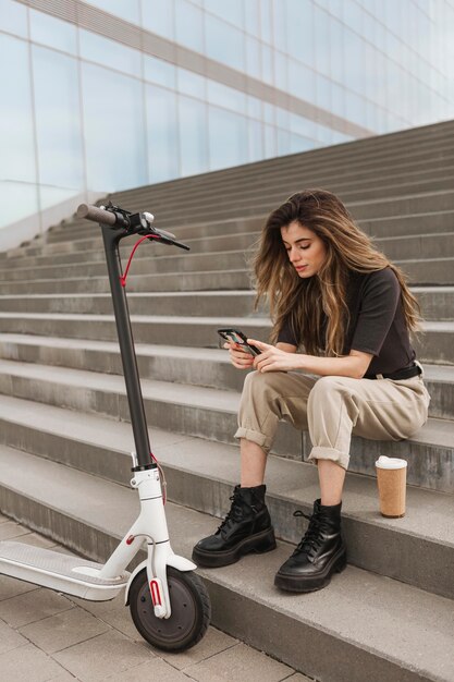 Young woman browsing her mobile phone