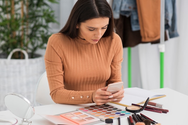 Young woman browsing her phone