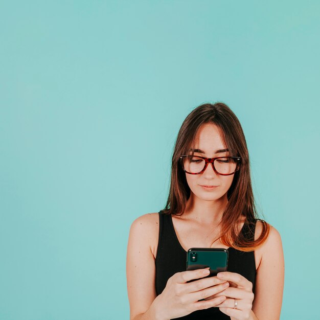 Young woman browsing smartphone