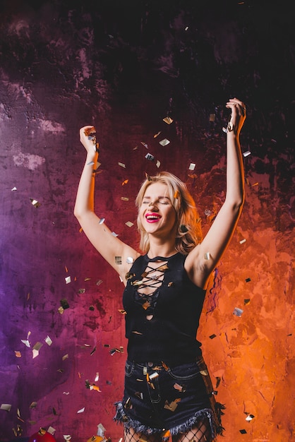 Young woman in confetti