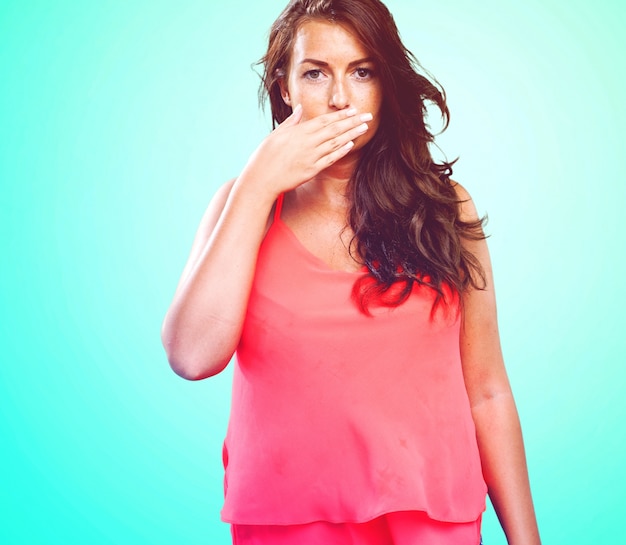 Free photo young woman covering her mouth