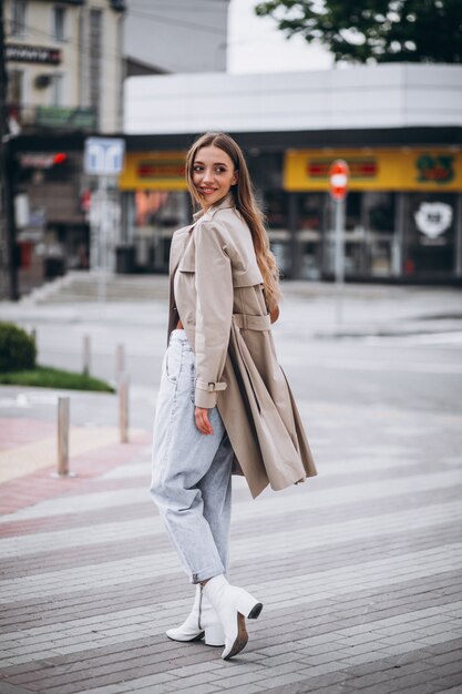 Young woman at the crosswalk in the city center