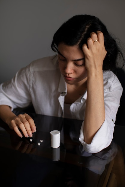 Free photo young woman dealing with anxiety