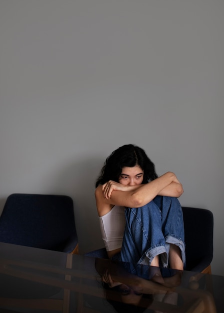 Free photo young woman dealing with anxiety