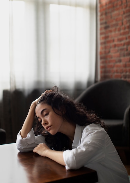 Free photo young woman dealing with anxiety