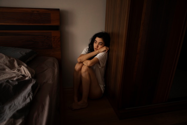 Free photo young woman dealing with anxiety