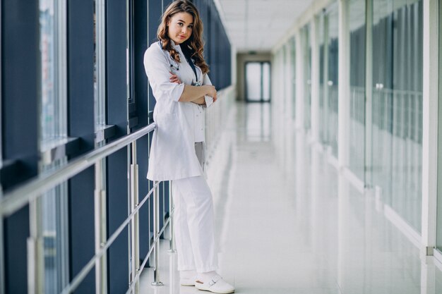 Young woman doctor with stethoscope at hospital