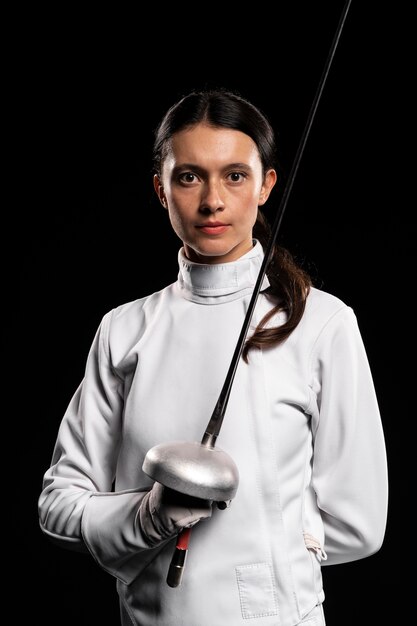 Young woman doing fencing