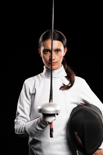 Young woman doing fencing