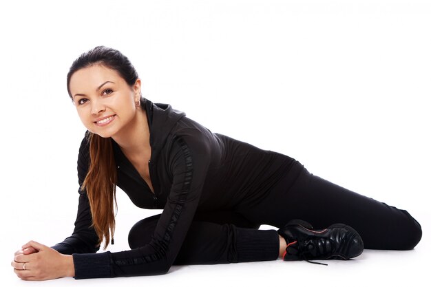 Young woman doing fitness exercises