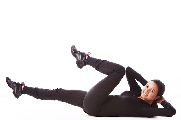 Young woman doing fitness exercises