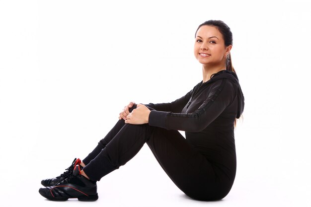 Young woman doing fitness exercises