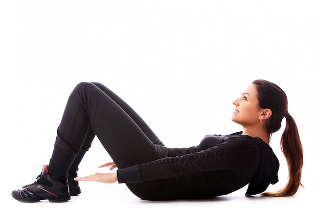 Young woman doing fitness exercises