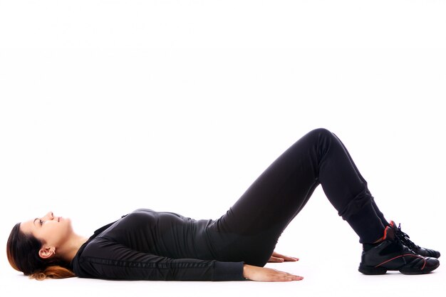 Young woman doing fitness exercises