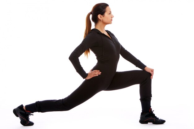 Young woman doing fitness exercises