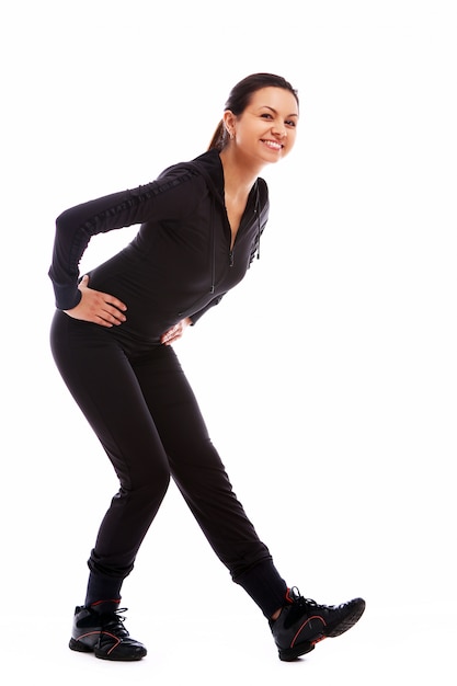 Young woman doing fitness exercises