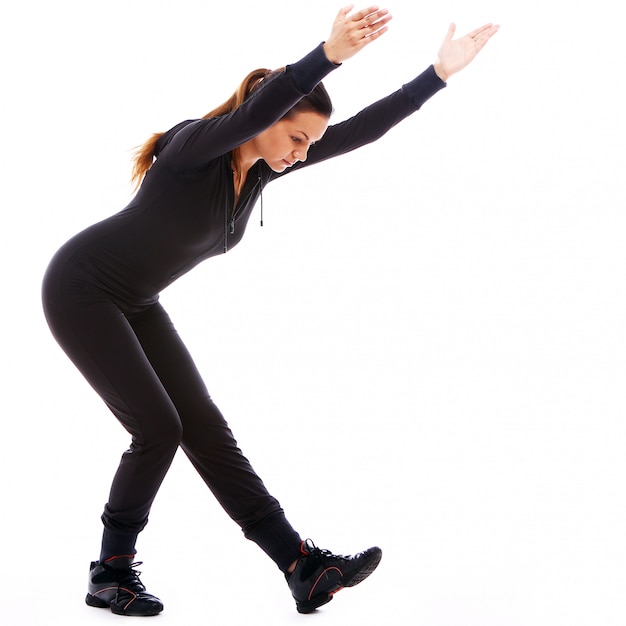 Young woman doing fitness exercises