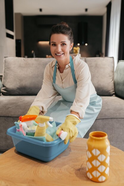 young woman doing housework and looking busy