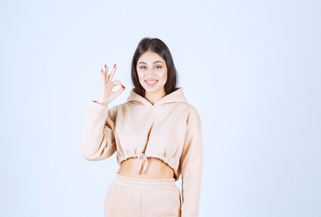 Young woman doing meditation and showing hand postures