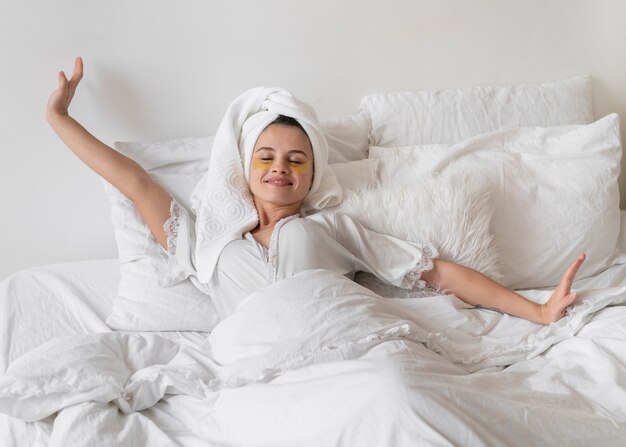 Young woman doing a self care routine at home