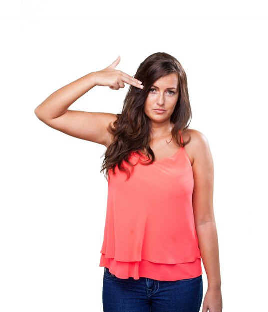 Free photo young woman doing a suicide gesture