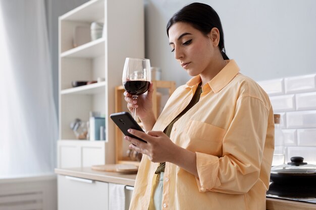 Young woman drinking red wine