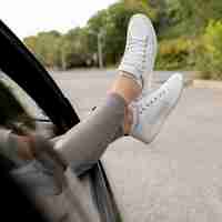 Free photo young woman enjoying road trip