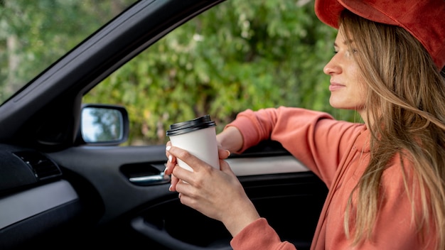 Young woman enjoying road trip