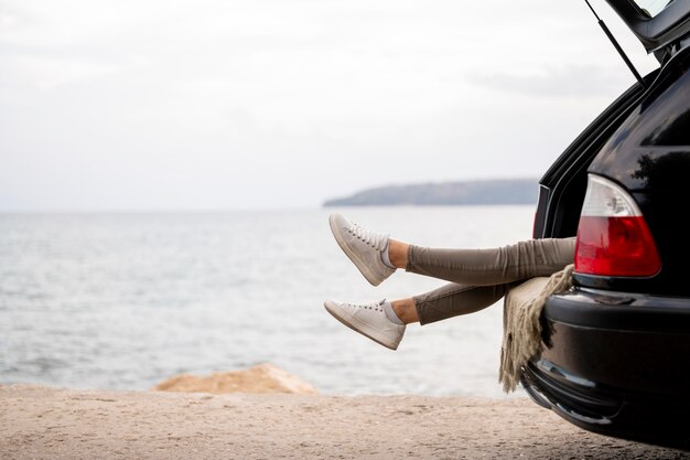 Young woman enjoying road trip