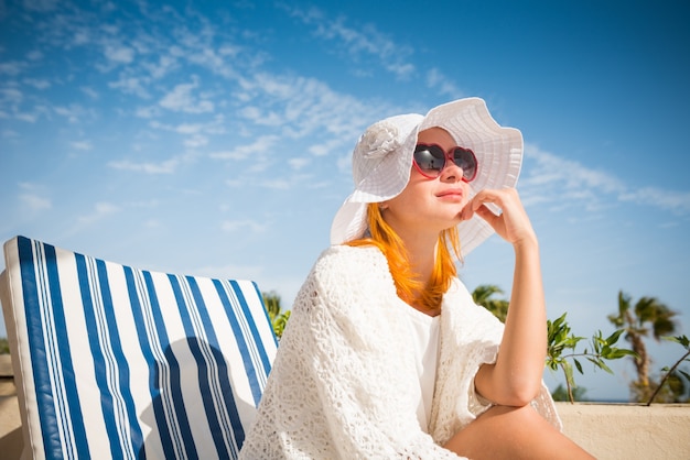 Young woman enjoying sun