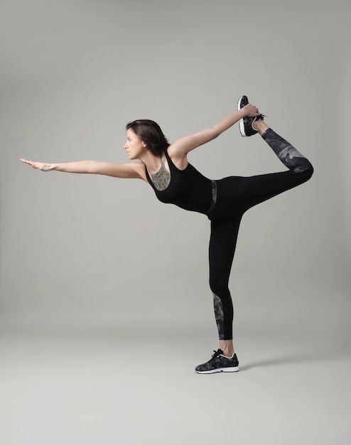 Young woman exercising, fitness