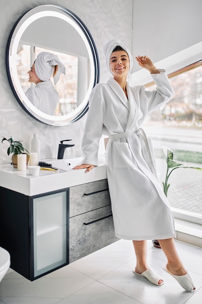 Young woman feeling good indoors