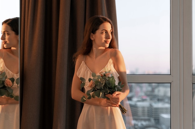 Free photo young woman getting ready for wedding