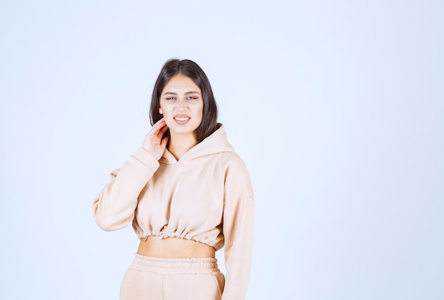 Young woman giving neutral and pretty poses