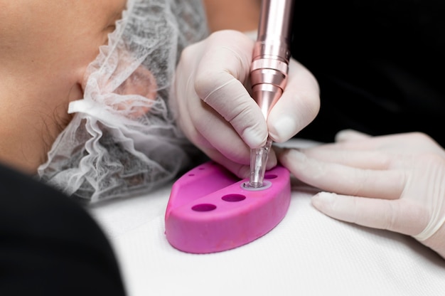 Young woman going through a microblading treatment