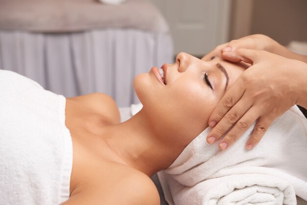 Young Woman Having Anti Age Treatment In Spa salon