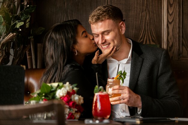 Young woman having a bouquet of roses from her boyfriend