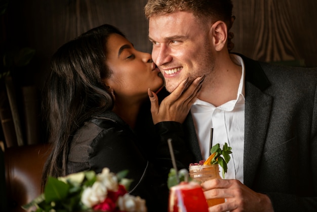 Young woman having a bouquet of roses from her boyfriend