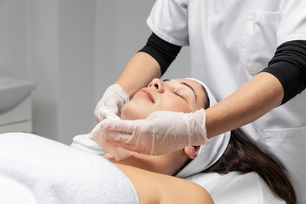 Young woman having a facial skincare treatment