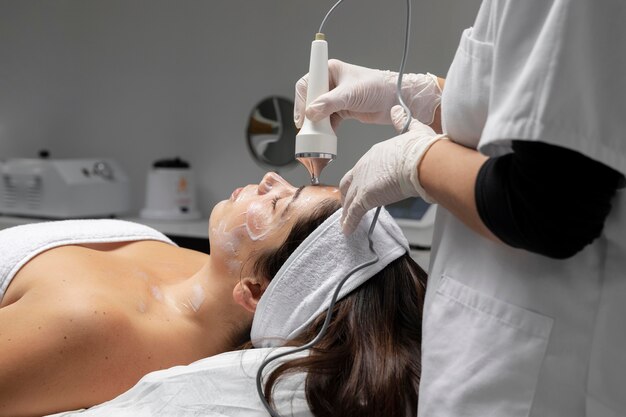 Young woman having a facial treatment