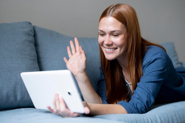 Young woman having a family videocall